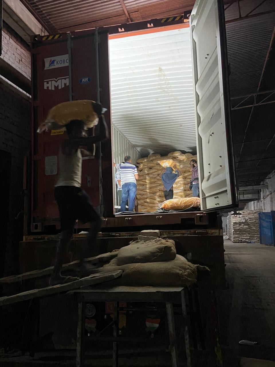 Rice being loaded into a container